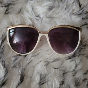 White and gold trim sunglasses